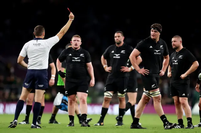 Scott Barrett is shown a red card by Matthew Carley