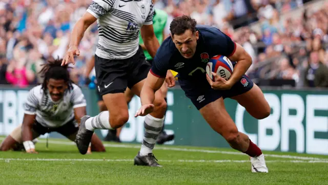 Jonny May scores a try for England