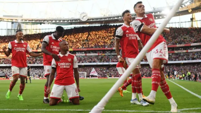 Arsenal celebrate scoring against Fulham last season