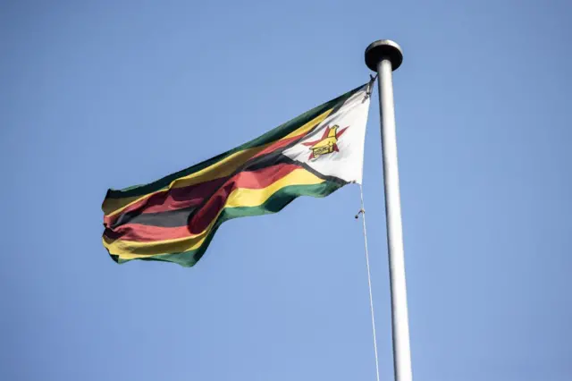 The Zimbabwean national flag pictured outside a court in the capital, Harare.