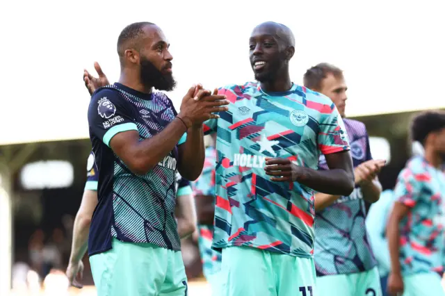 Wissa and Mbeumo high five aftter another Brentford goal.