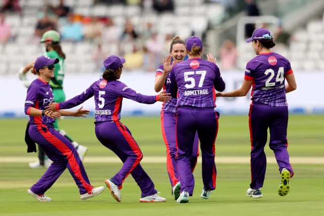 Kate Cross celebrates a wicket