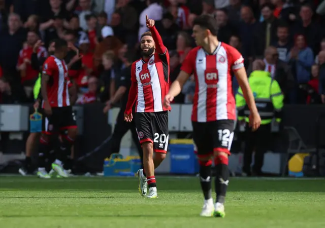 Bogle celebrates his equaliser.