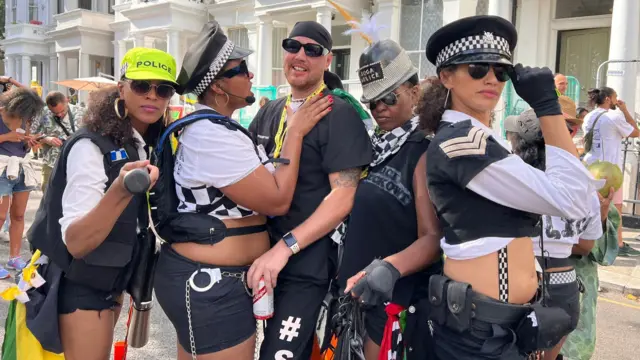 A group of people in police costumes