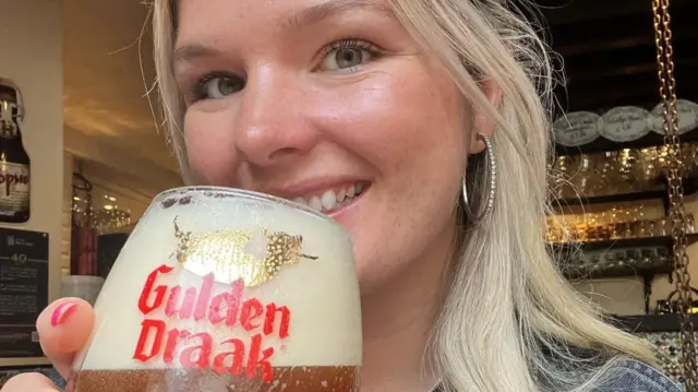 Laura Wood drinking Belgian beer