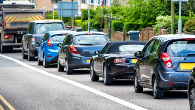 A traffic jam of cars on a London road