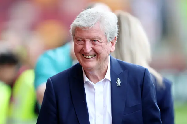 Roy Hodgson smiling as he arrives before a game