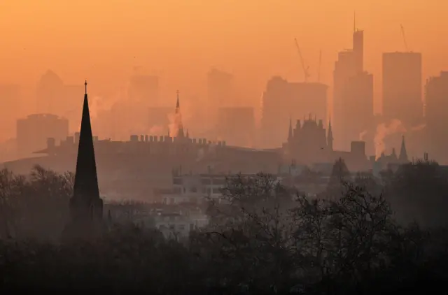 A view of early morning smog over the City of London