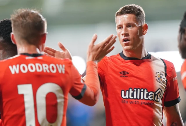 Ross Barkley and Cauley Woodrow high five after the game