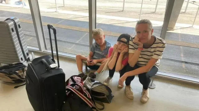 One family is stranded at an airport