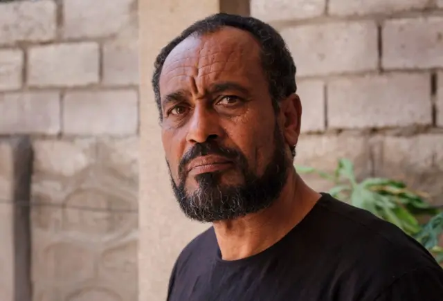 Bekele Gerba poses as he is interviewed with AFP at Gerbas home in Adama, Ethiopia, on February 15, 2018.