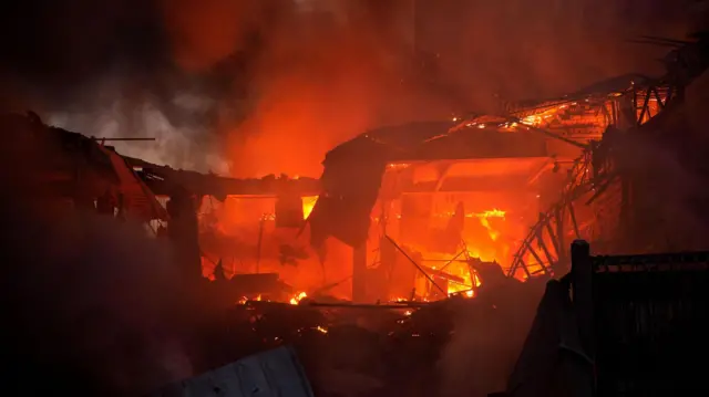 Fire at the site of a missile strike in Kyiv