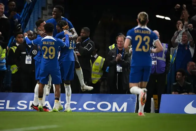 Enzo Fernandez (unseen) celebrates with teammates