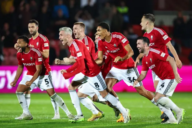 Salford City players celebrate