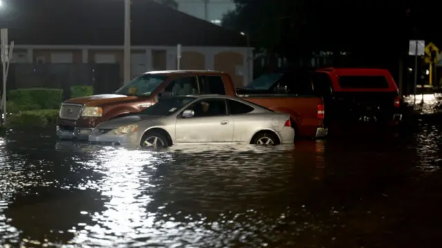 Cars on flooded street