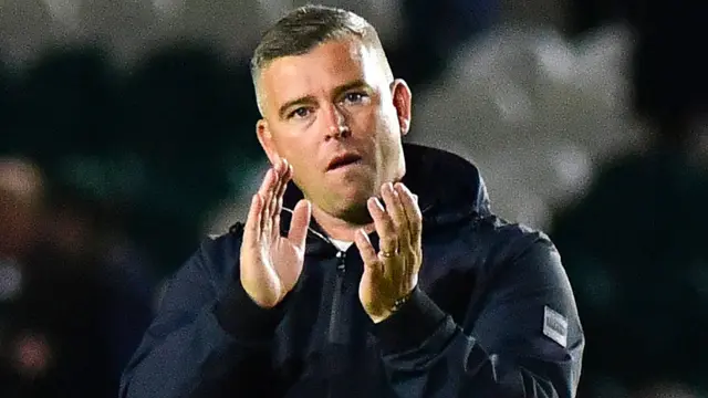 Steven Schumacher applauds the Argyle fans