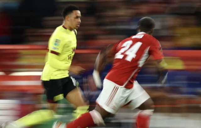 Burnley's Aaron Ramsey in action with Nottingham Forest's Serge Aurier Action