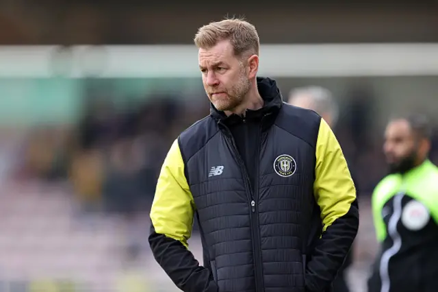 Simon Weaver looks on from the touchline