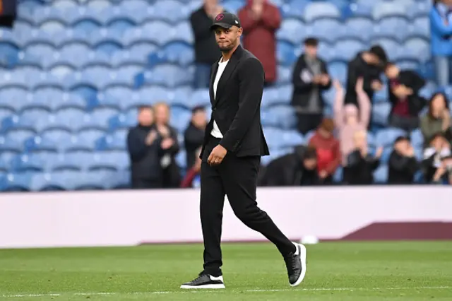 Vincent Kompany walks across the pitch at Turf Moor