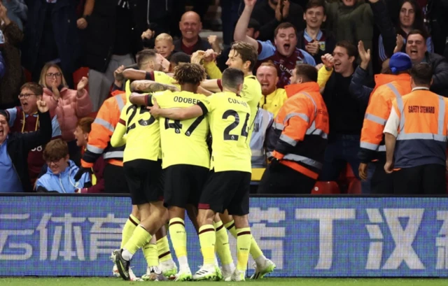 Burnley's Zeki Amdouni celebrates scoring their first goal with teammates