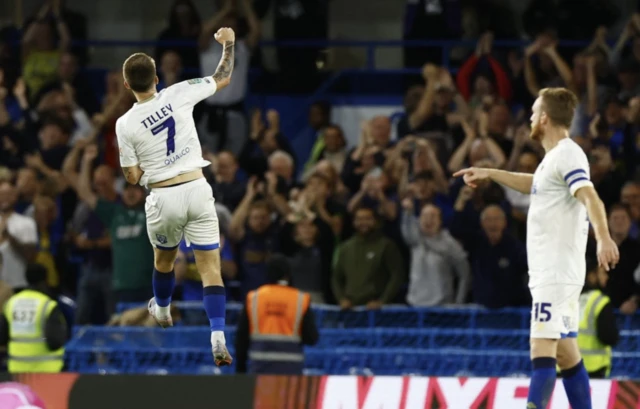 James Tilley jumps in the air celebrating