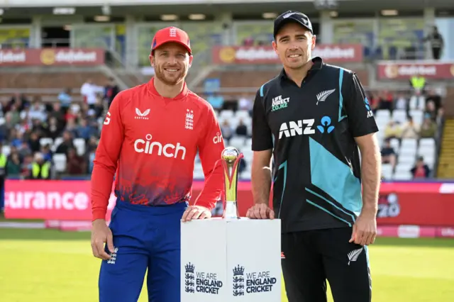 Jos Buttler and Tim Southee with T20 series trophy