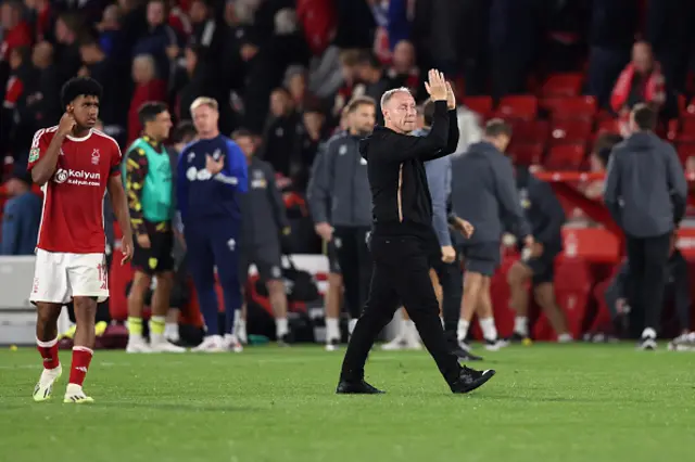 Steve Cooper applauds fans after the final whistle