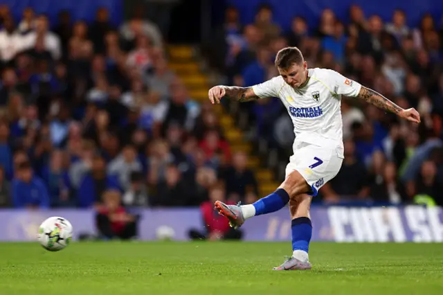 James Tilley shoots from the penalty spot