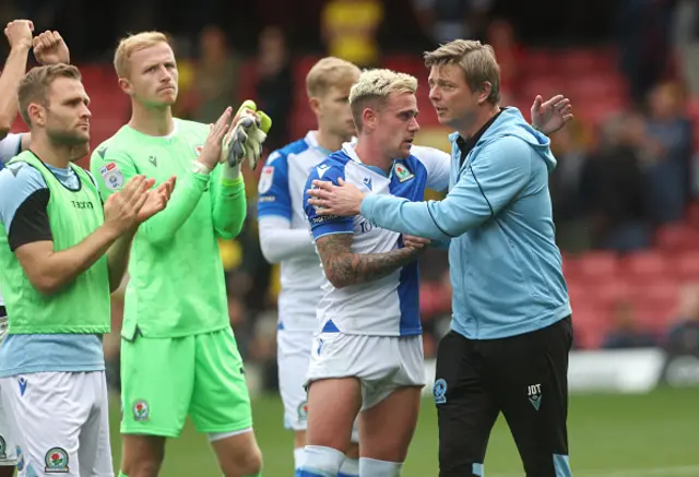 Blackburn Rovers boss Jon Dahl Tomasson and player Sammie Szmodics shake hands