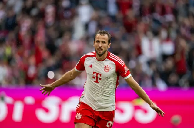 Harry Kane celebrates after a penalty scored during the Bundesliga match between Bayern Munich and Augsburg.