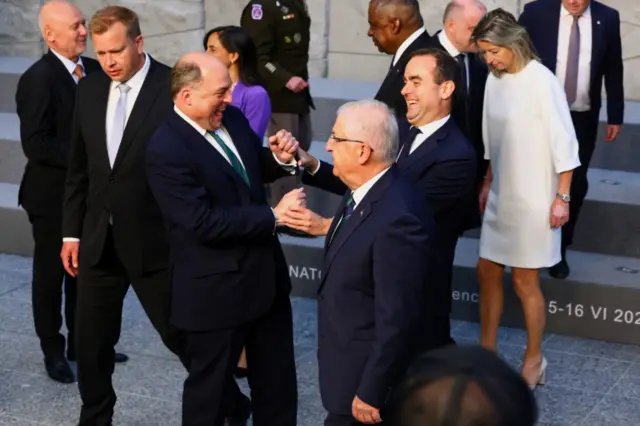 Turkish Defence Minister Yasar Guler, British Secretary of State for Defence Ben Wallace and France"s Defence Minister Sebastien Lecornu prepare to pose for a family photo during a Nato defence ministers' meeting, June 2023