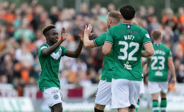 Dundee United's Mathew Cudjoe celebrates after making it 2-0