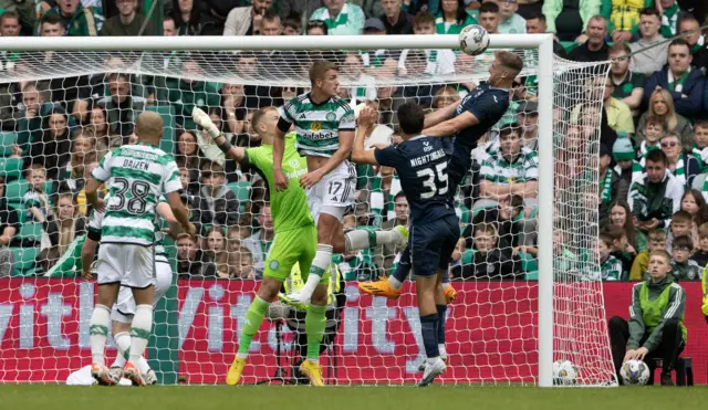 Ross County's Jordan White scores to make it 3-1 during a cinch Premiership match between Celtic and Ross County at Celtic Park,