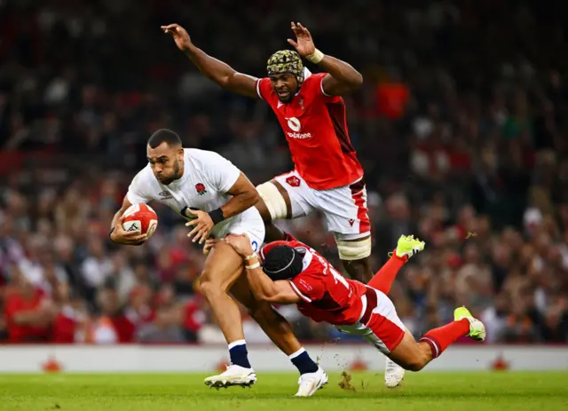 Max Malins is tackled by Leigh Halfpenny