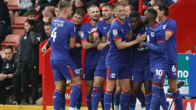 MK Dons celebrate