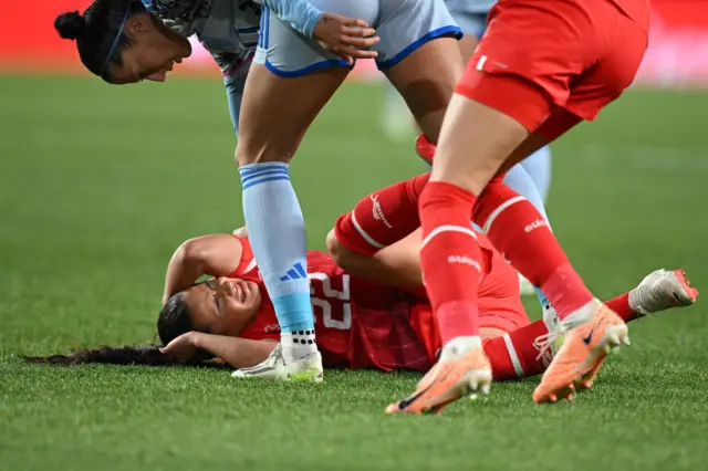 Meriame Terchoun of Switzerland goes down with an injury