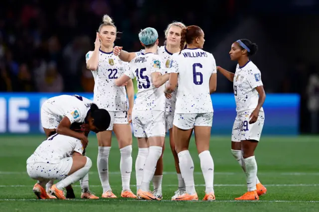 USA players look dejected at full-time