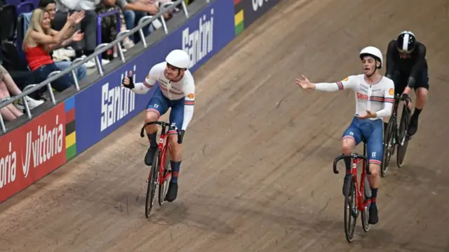 Jaco van Gass celebrates beating Finlay Graham to gold