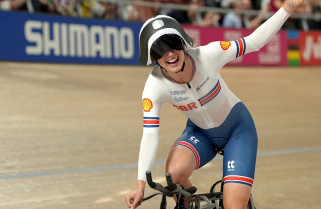 Britain's Elinor Barker celebrates after winning the women's elite team pursuit gold medal