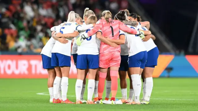 England XI in a huddle