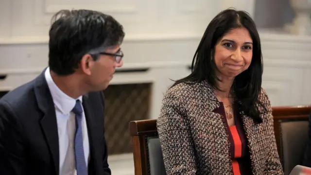 Rishi Sunak and Suella Braverman sit in a meeting