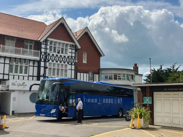 Coach parked outside the Chine Hotel in Bournemouth