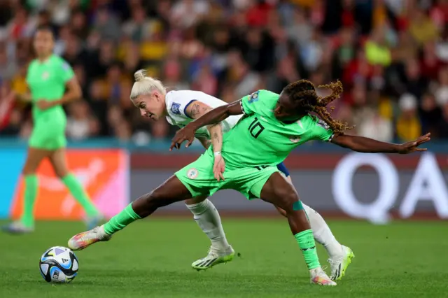 Christy Ucheibe of Nigeria and Beth England of England compete for the ball during the FIFA Women's World Cup Australia & New Zealand 2023