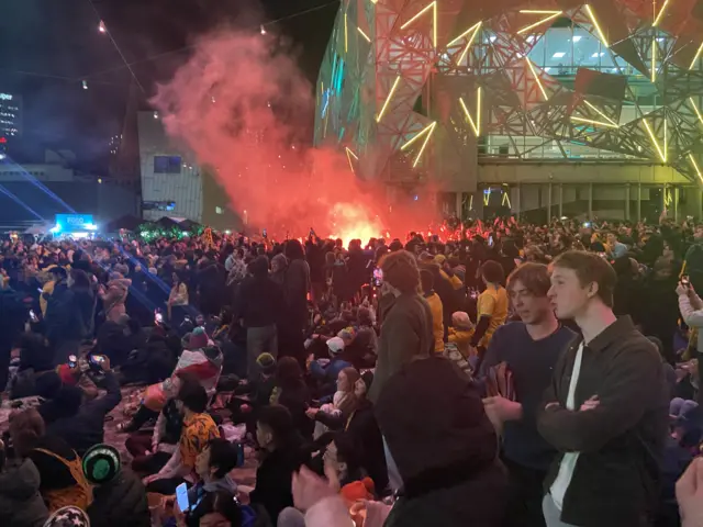 A flare in Melbourne fan park