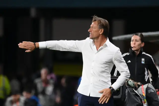 Herve Renard gestures instructions to his players from the sideline.