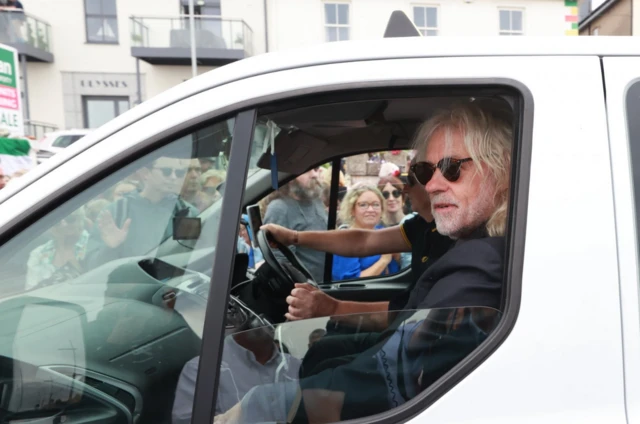 Bob Geldof in a taxi as part of Sinead O'Connor's funeral cortege