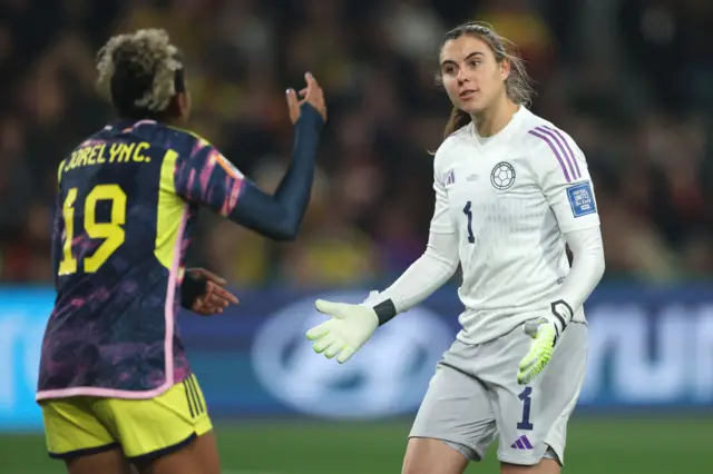 Keeper and defender argue after a near catastrophic mix up.