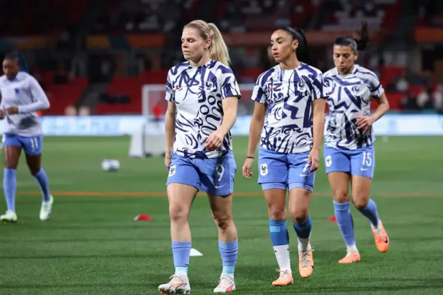 Le Sommer warms up ahead of Morocco match.
