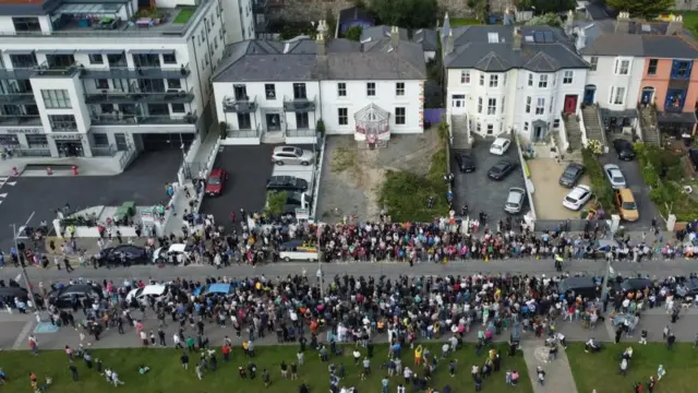 A bird-eye view of a crowd on a street