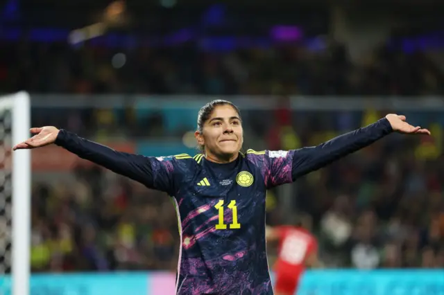 Usme gees up the Colombia fans.